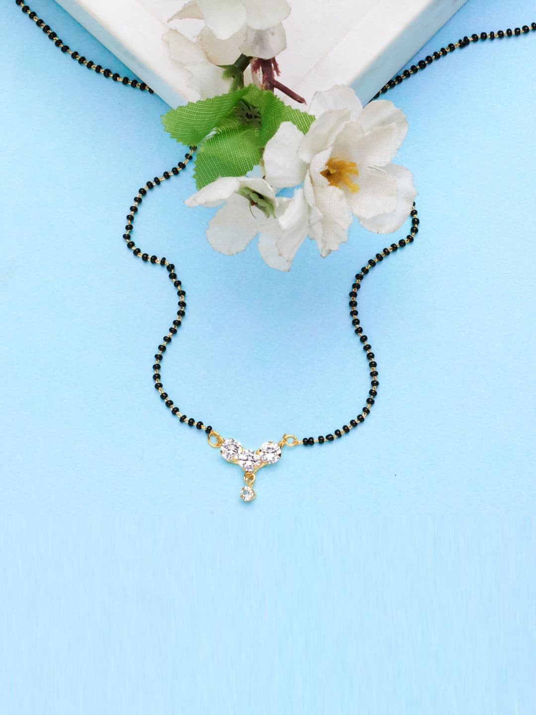 ATIBELLE Gold-Plated White AD-Studded Black Beaded Mangalsutra