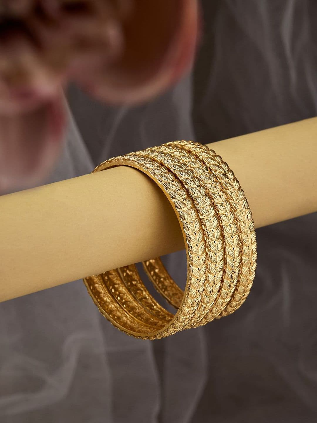 ATIBELLE Set of 4 Gold-Plated Leaf Shaped-Textured Bangles - Image 1