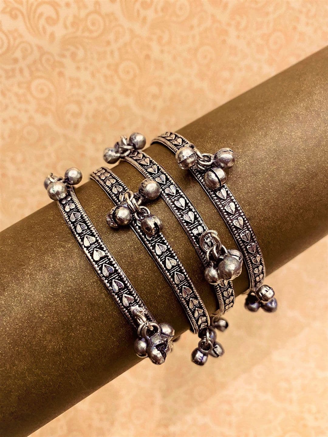 ATIBELLE Set Of 4 Silver-Plated & Ghunghroo Stone-Studded Leaf Shaped Bangles - Image 1