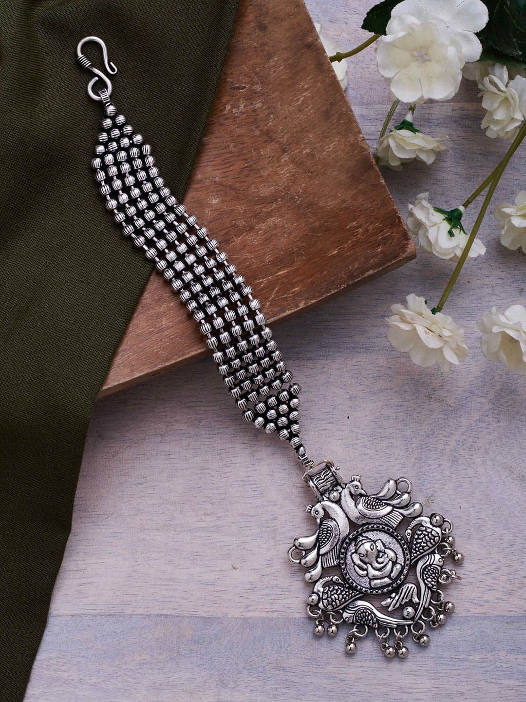 ATIBELLE Silver-Plated Ganesha Inspired Contemporary Maangtikka - Image 1