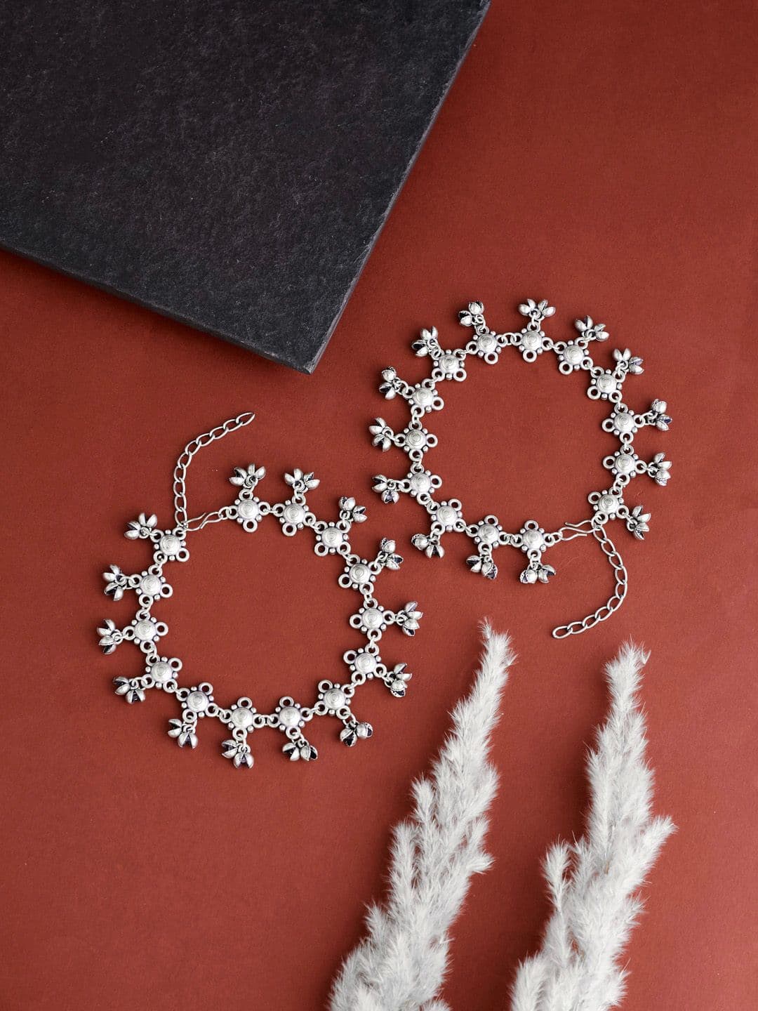 ATIBELLE Set Of 2 Silver-Plated & Floral Shaped Ghunghroo Studded Anklets - Image 1