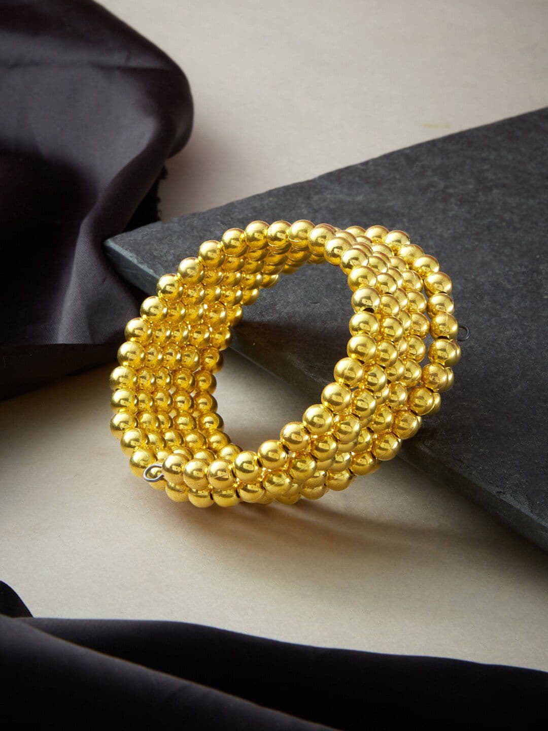 ATIBELLE Gold Plated & Beaded Layered Adjustable Spiral Bangle Style Bracelet - Image 1