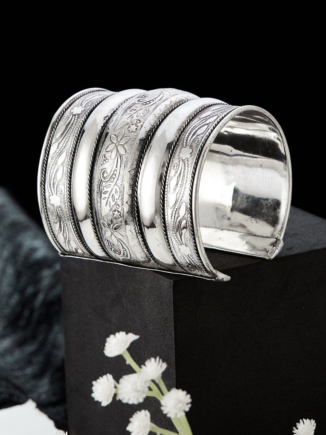 ATIBELLE German Silver-Plated Floral Textured Round Shaped Bangle - Image 1