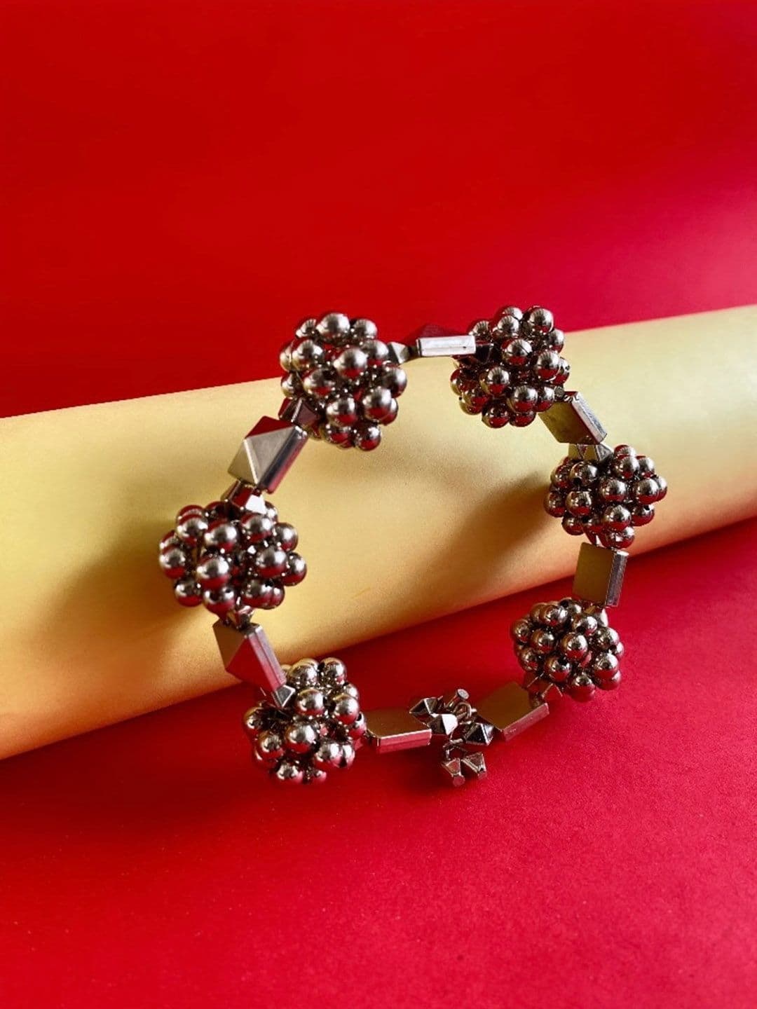ATIBELLE Silver Plated & Floral Shaped Ghunghroo Studded Adjustable Bangle - Image 1