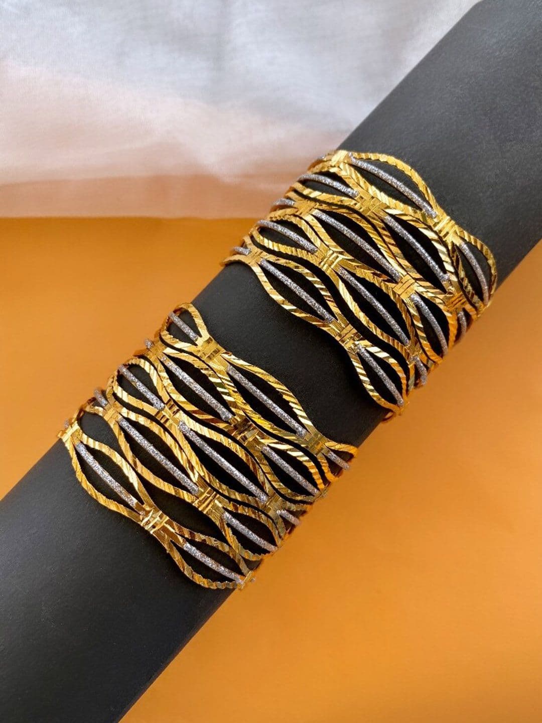 ATIBELLE Set Of 10 Gold-Plated Textured Wavy-Shaped Bangles - Image 1
