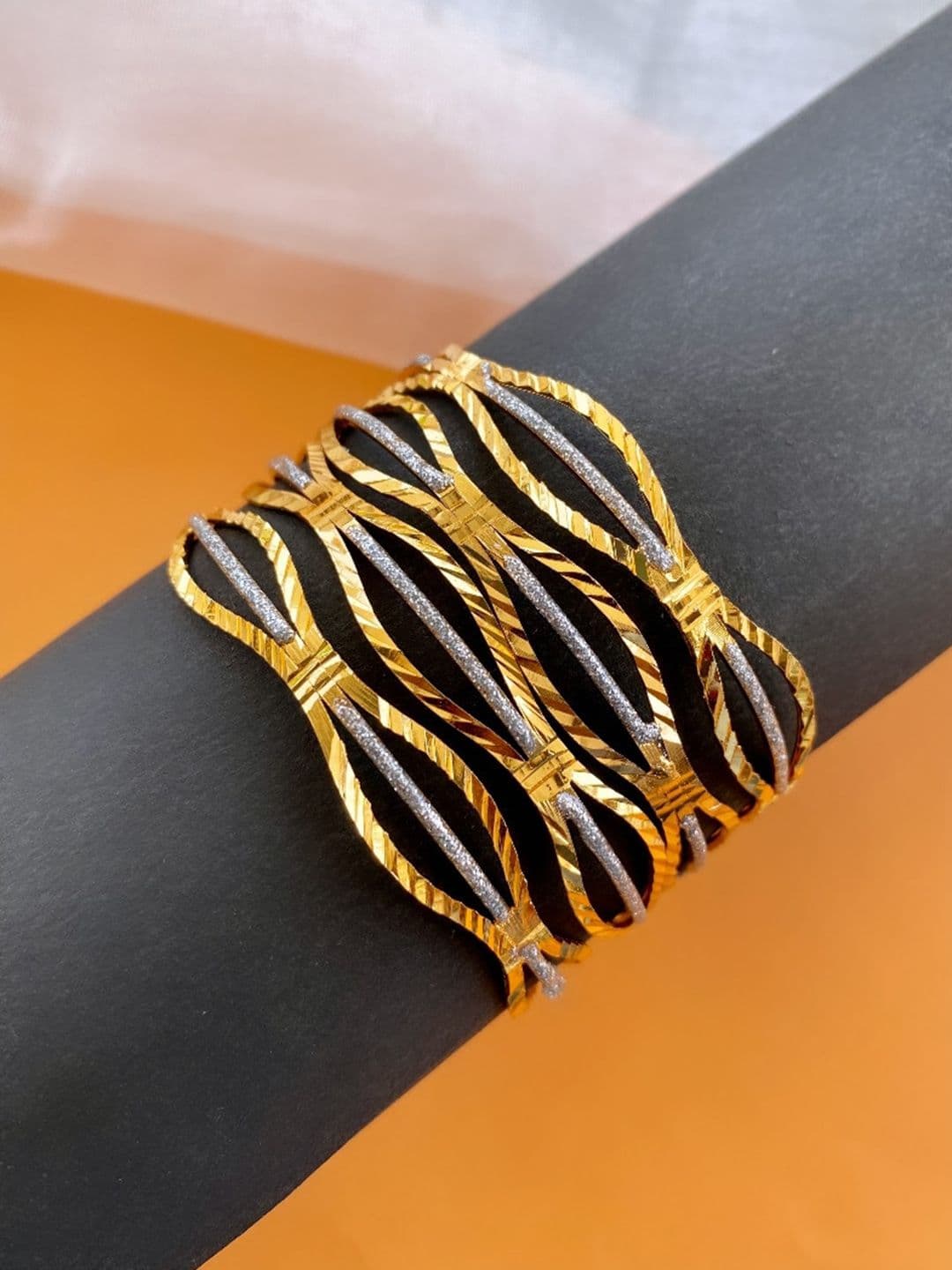 ATIBELLE Set Of 4 Gold Plated Stones Studded Bangles - Image 1