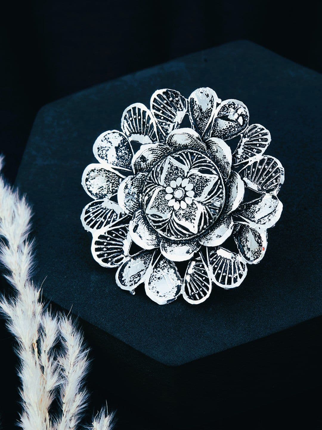 ATIBELLE German Silver Silver-Plated Floral Textured Adjustable Finger Ring - Image 1