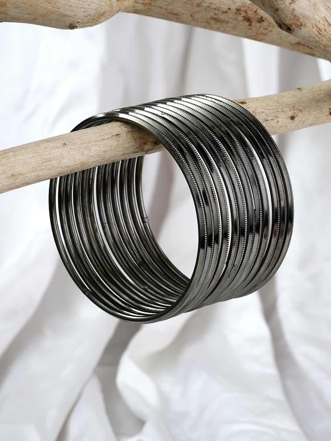 ATIBELLE Set Of 12 Silver-Plated Textured Bangles - Image 1