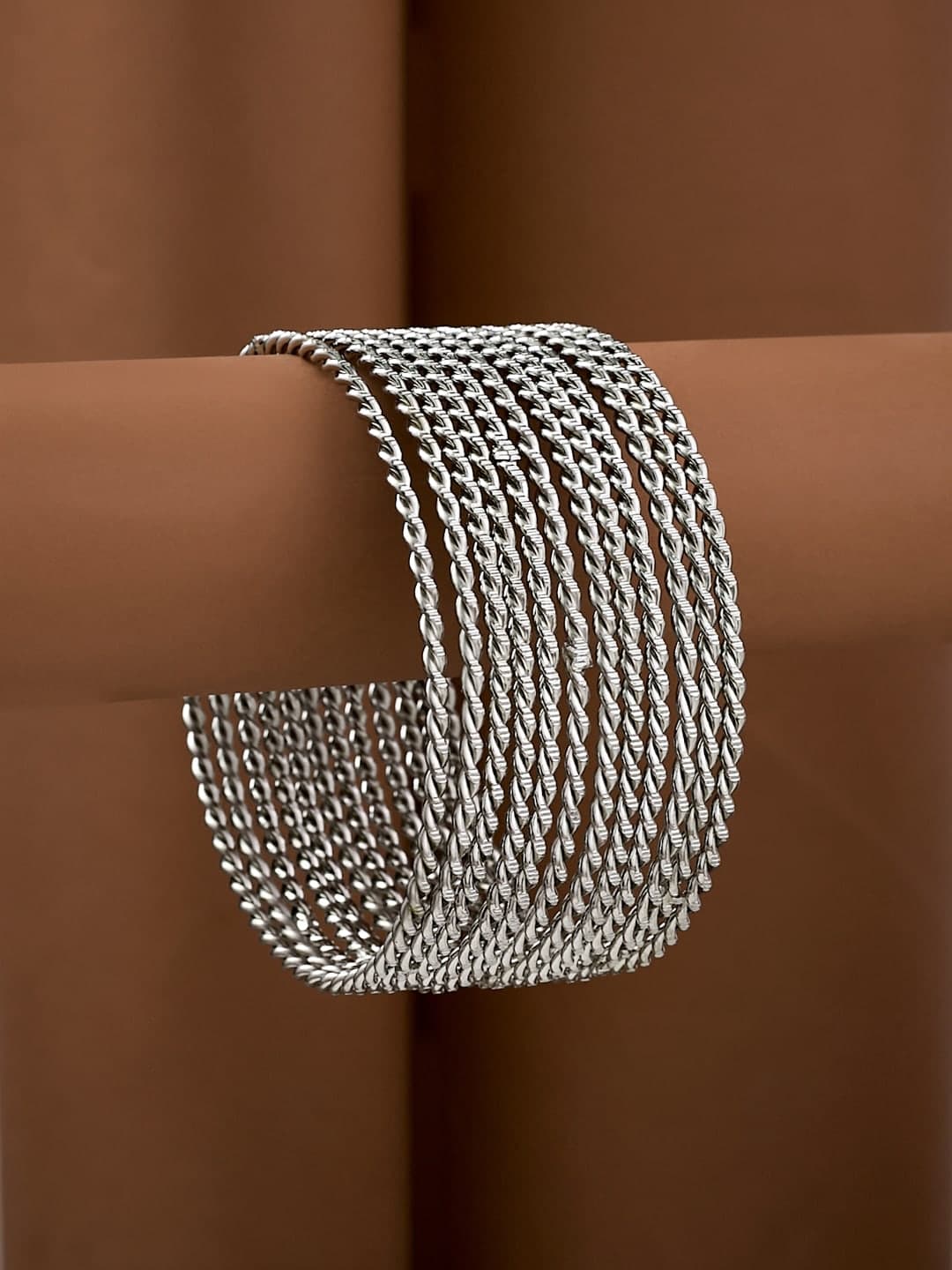 ATIBELLE Set Of 12 Silver-Plated Wavy Shaped Textured Bangles - Image 1