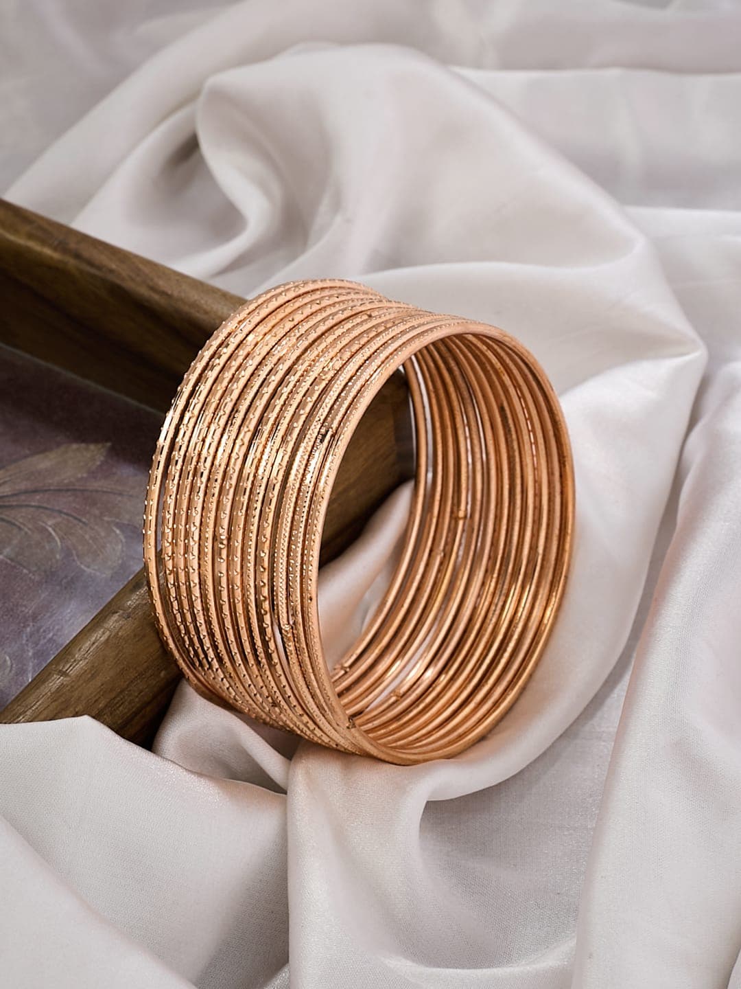 ATIBELLE Set Of 12 Rose Gold-Plated Textured Bangles - Image 1