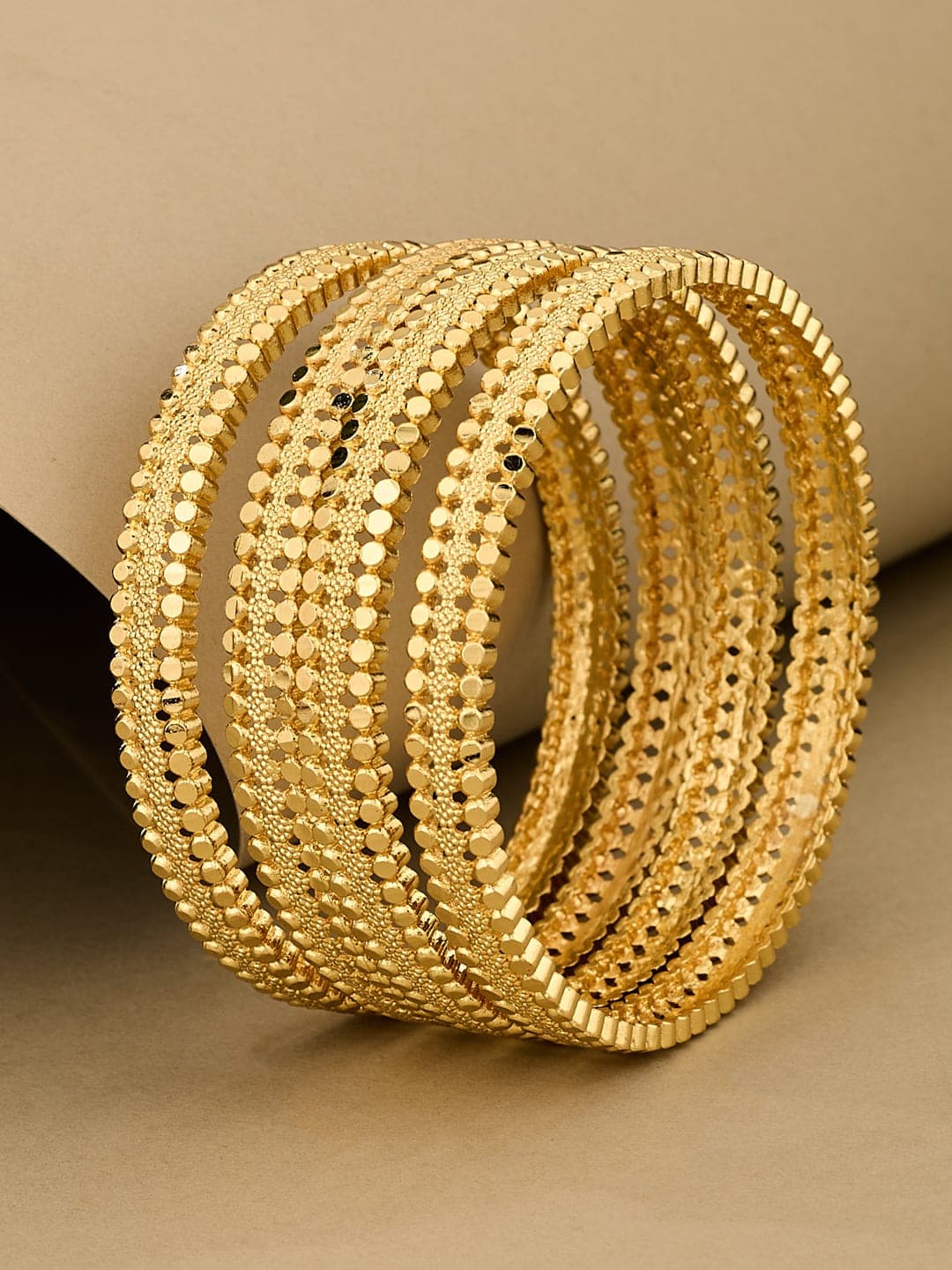 ATIBELLE Set Of 4 Gold-Plated Floral Shaped Textured Bangles - Image 1
