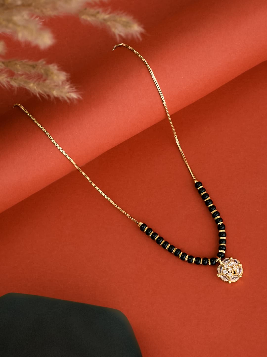 ATIBELLE Gold-Plated Cubic Zirconia Stone Studded & Beaded Floral Shaped Mangalsutra - Image 1