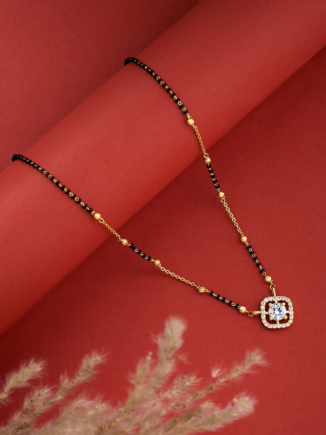 ATIBELLE Gold-Plated Cubic Zirconia Stone Studded & Beaded Round Shaped Mangalsutra - Image 1