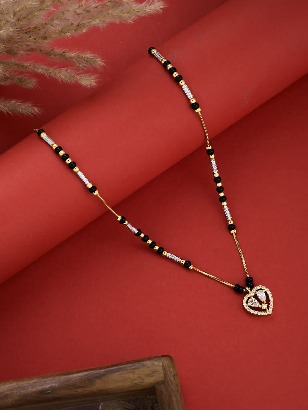 ATIBELLE Gold-Plated Cubic Zirconia Stone Studded & Beaded Heart Shaped Mangalsutra - Image 1